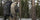 Side of Hunter Wearing Ultra Merino 120 LT LS Hoodie in Valo Camouflage