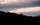 Skylined Silouhette of Bull Elk Following Cow
