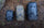 Waypoint 2800 in black, Waypoint 5500 in bourbon, and Waypont 10400 in black laid horizontally from left to right next to each other on top of ground covered in pine needles