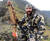 AJ Kissel on Rocky Ridge with Tradition Bow in Hand Wearing Vias Camouflage