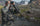 Justin Shaffer in Verde Camouflage looking for Stone Sheep while hunting in British Columbia