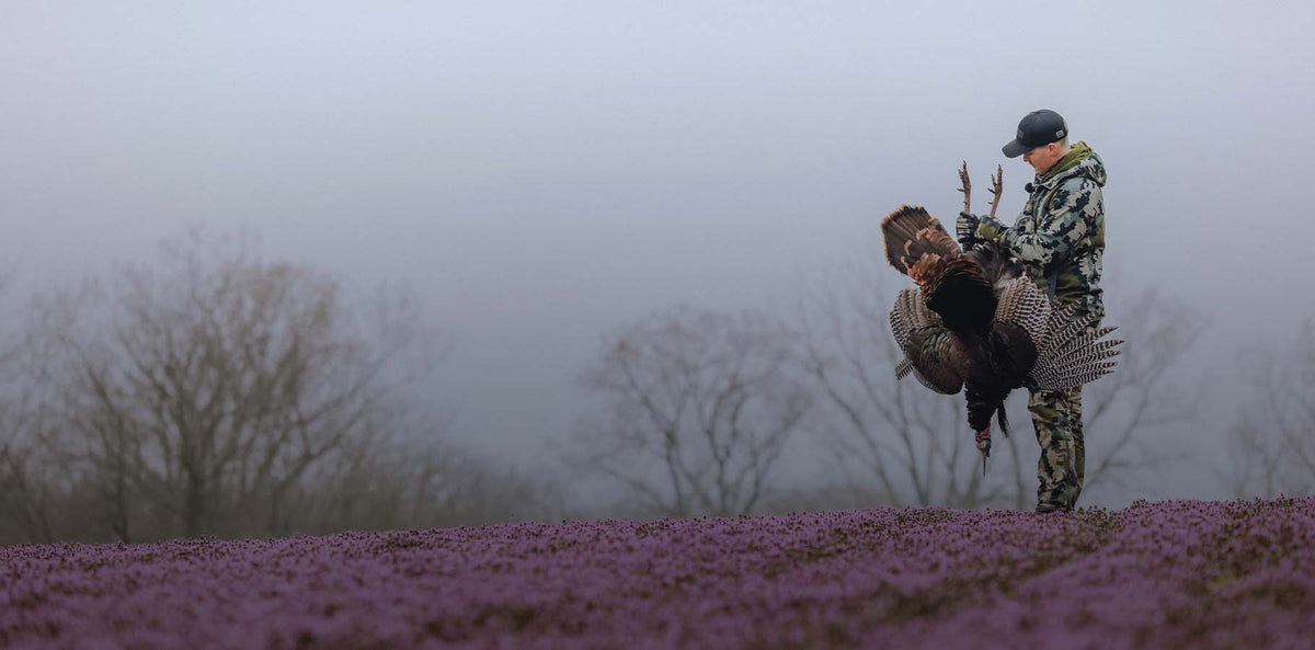 Successful turkey hunter at dawn