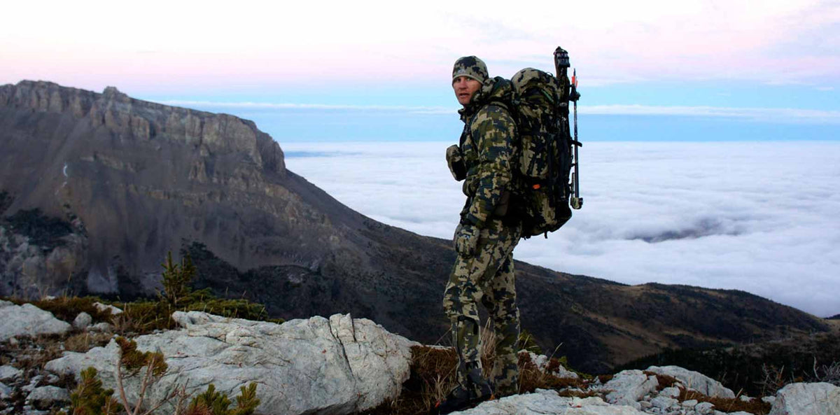 Side of Brendan Burns in Verde Camouflage in Montana Mountains Chasing Bighorn Sheep
