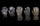 Five waterproof glove options displayed on mannequins