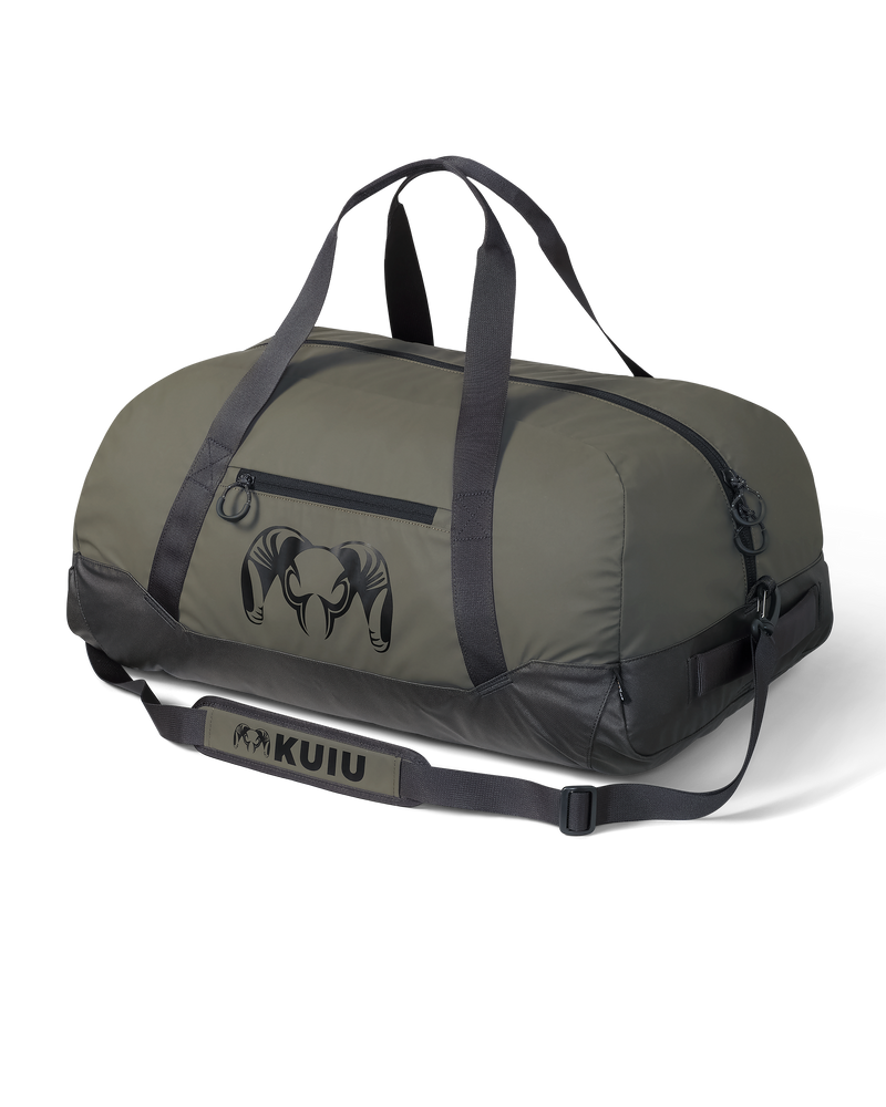 Front, Angled View, Opposite Side of Runway CORDURA® 3000 Duffel in Ash with KUIU Ram Logo and Shoulder Straps Shown

