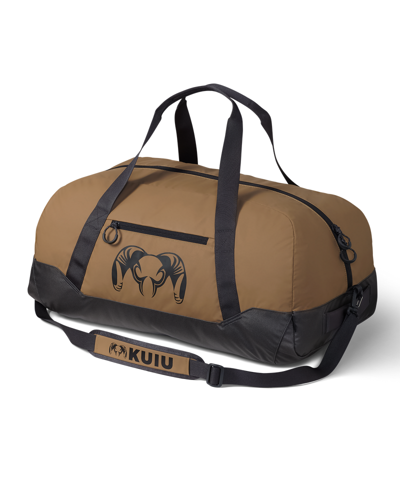 Front, Angled View, Opposite Side of Runway CORDURA® 3000 Duffel in Coyote Brown with KUIU Ram Logo and Shoulder Strap Shown