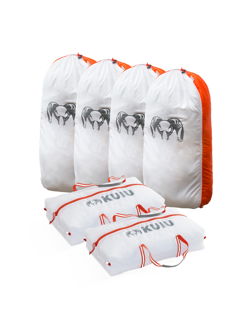 Picture of the Small Deer/Antelope Game Bag Set displaying four upright white and orange Quarter Game Bags in size small and two  horizontally laid Boned Out Game Bags in size small