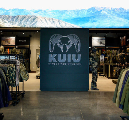 KUIU Denver Store interior with KUIU branding and outdoor-themed decor
