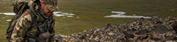 Front, Angled View of Kevin Wilkerson Hiking Up Hill Wearing Valo Camouflage